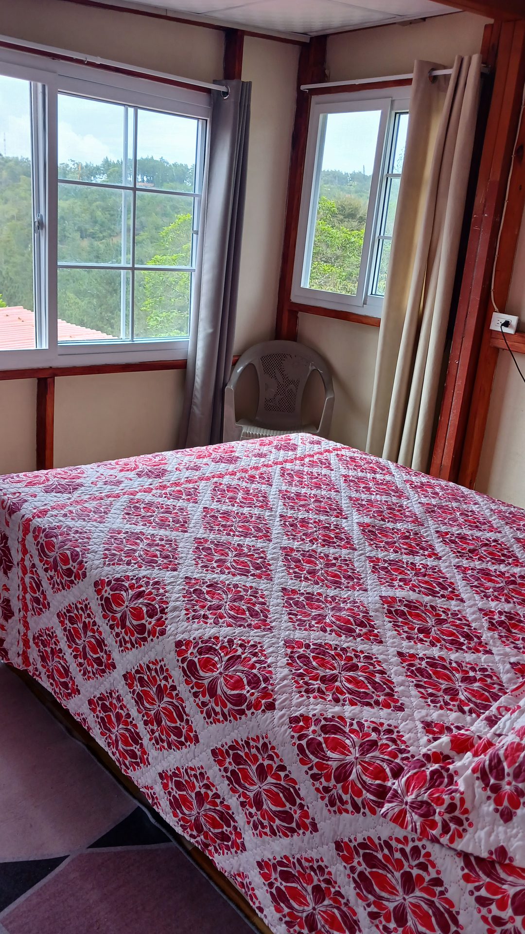 Dormitorio con vista en Cabaña El Quetzal